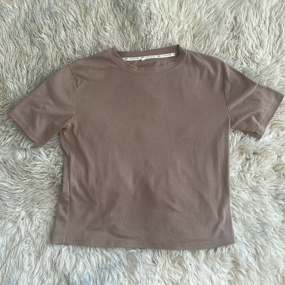 Tan colored round neck short sleeve